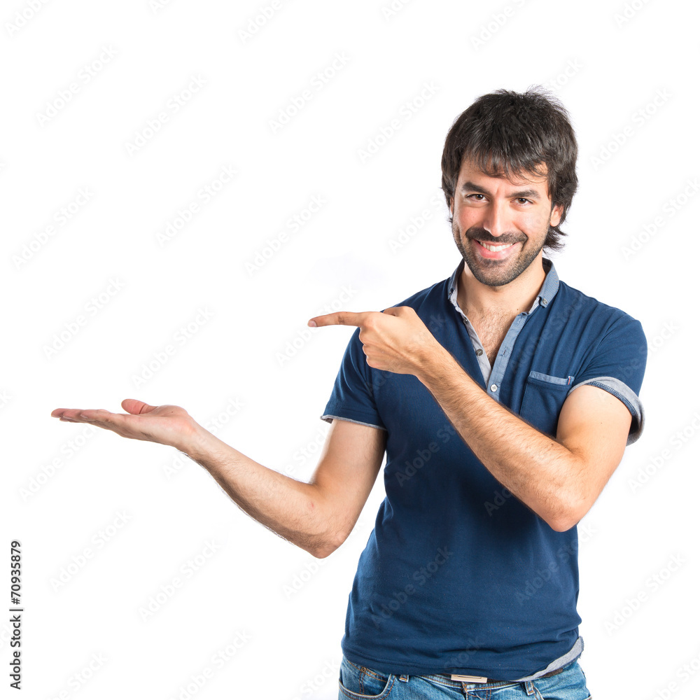 Man holding something over white background Man holding something over white background
