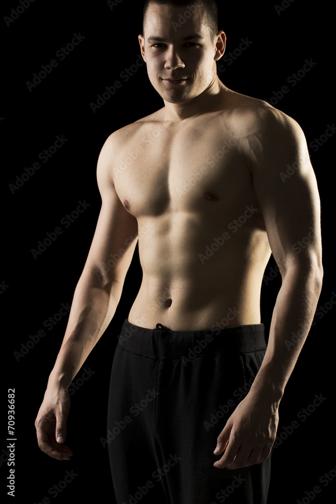 Fototapeta premium Athlete in a gym