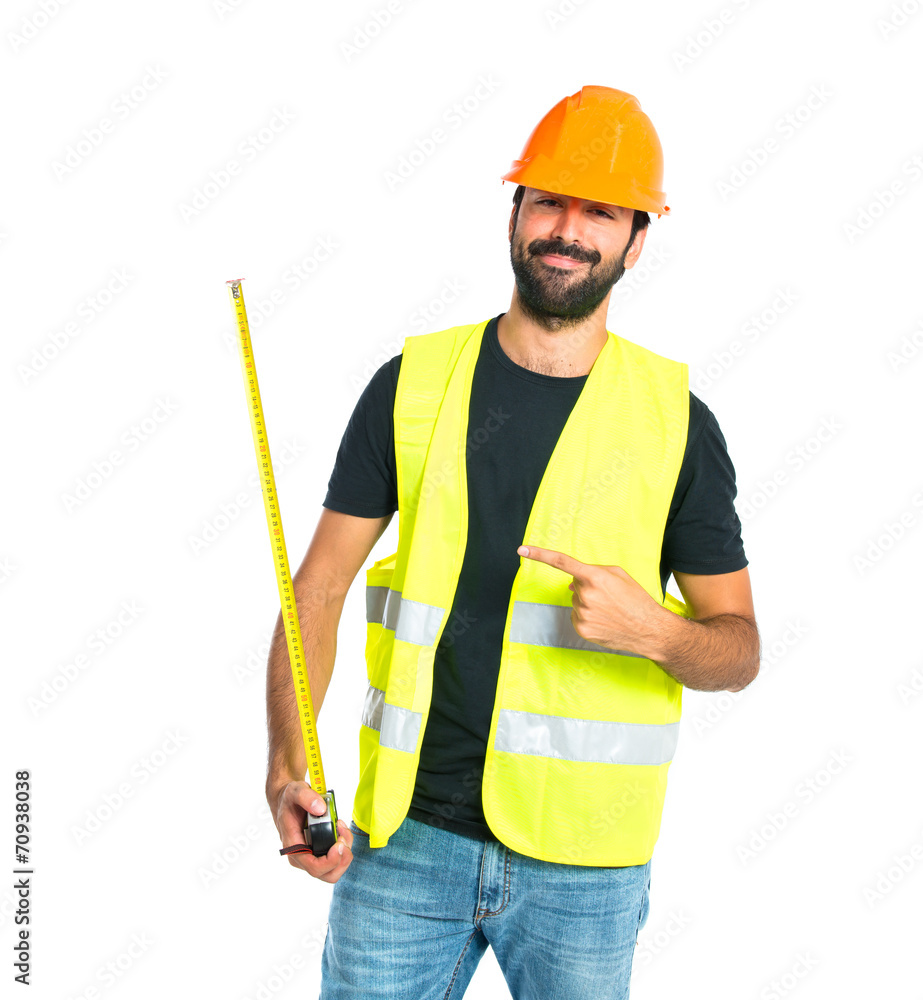 Workman with meter over white background Workman with meter over white background
