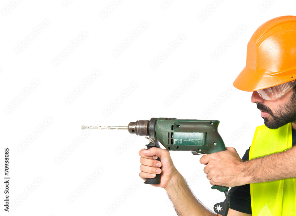 workman with drill over white background workman with drill over white background