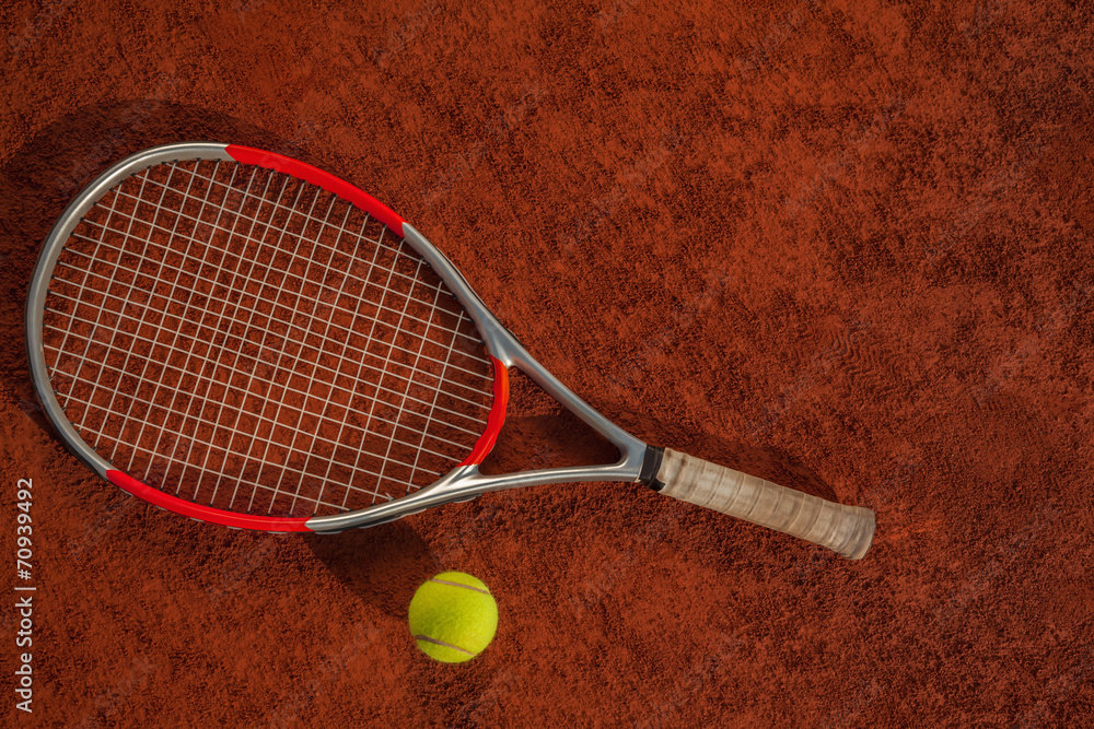 Tennis Racket And Ball On The Court