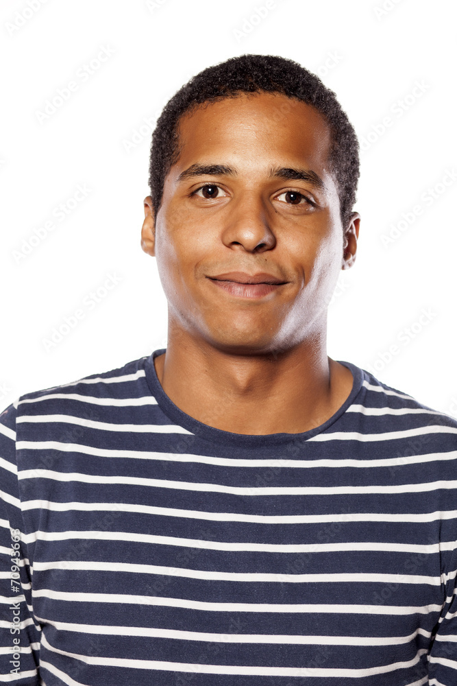 portrait of a smiling dark-skinned young man portrait of a smiling dark-skinned young man