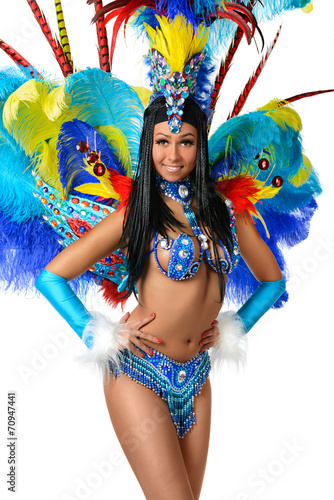 Smiling beautiful girl in a colorful carnival costume