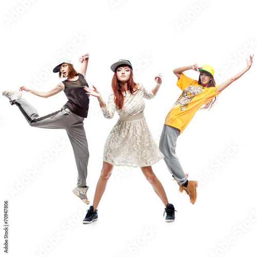 group of young femanle hip hop dancers on white background