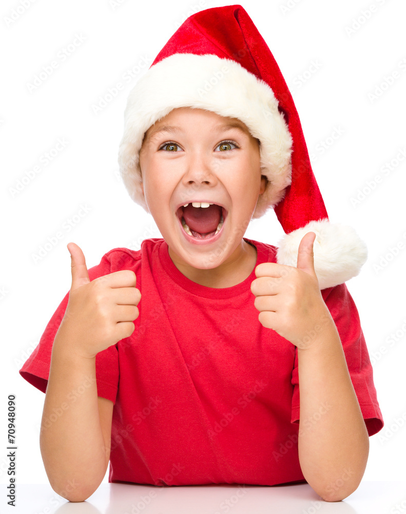 Little girl is showing thumb up sign Little girl is showing thumb up sign