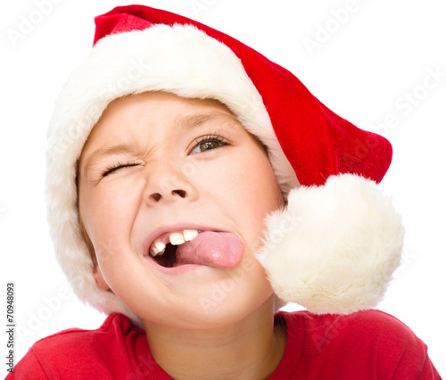 Little girl in santa hat photo