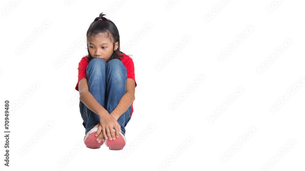 Sad and depressed young Asian girl over white background