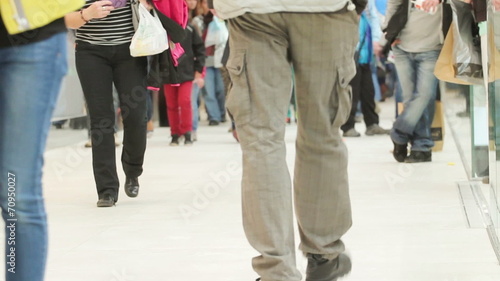 Slightly defocused crowd of people shopping in the shopping mall