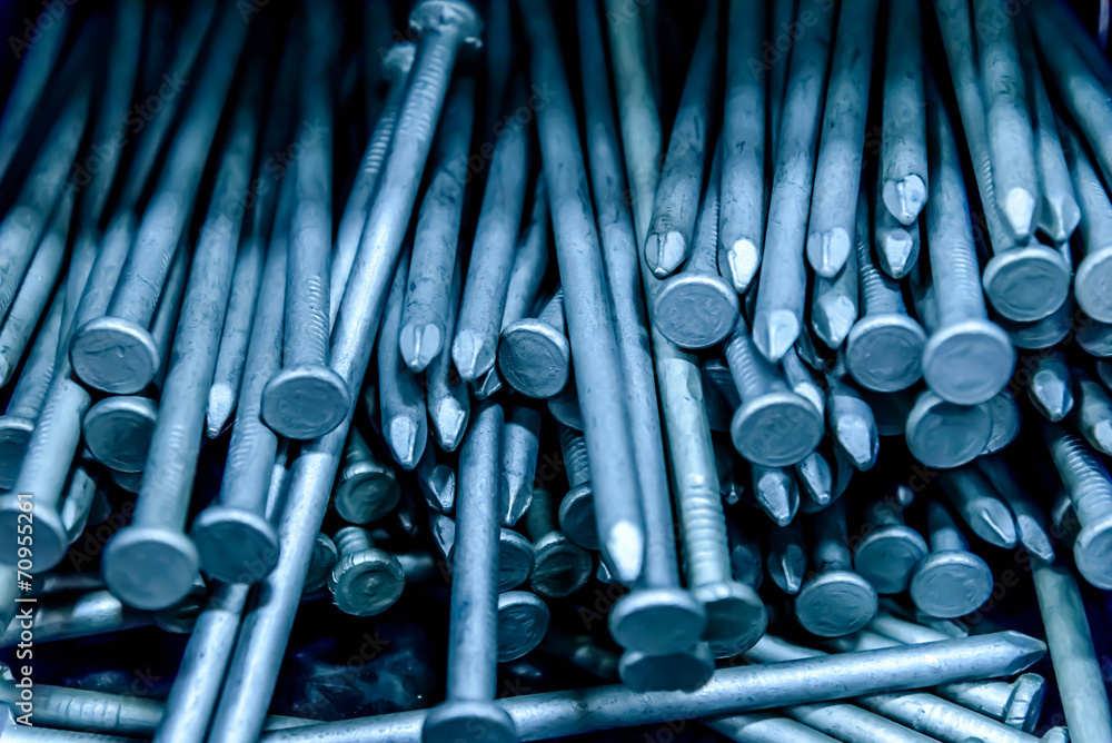 pile of silver construction nails pile of silver construction nails