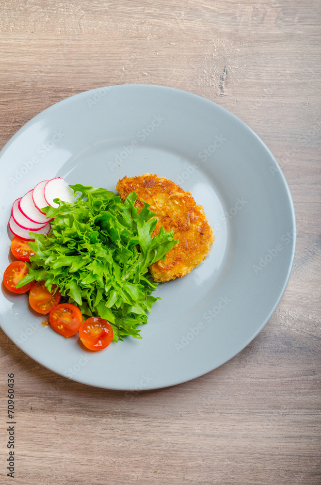 Breaded pork chops in Parmesan cheese Breaded pork chops in Parmesan cheese