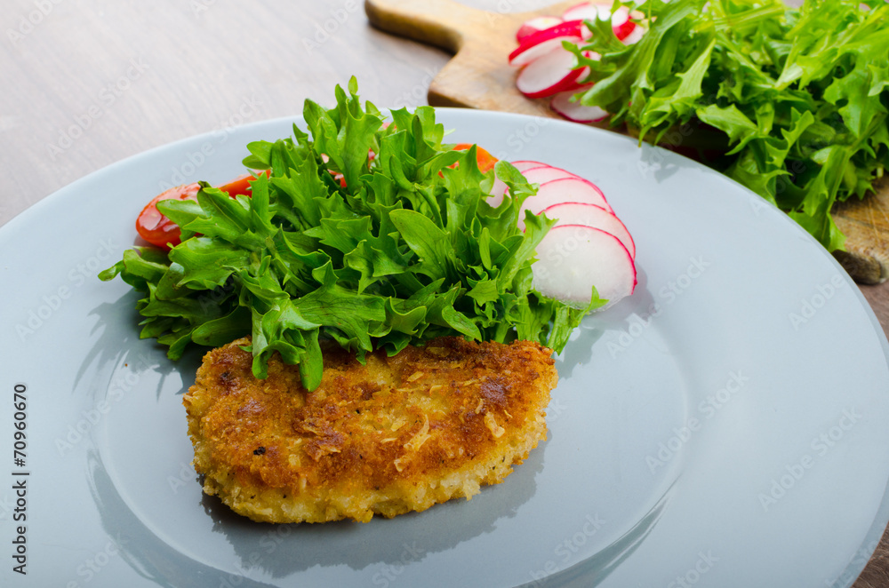 Breaded pork chops in Parmesan cheese Breaded pork chops in Parmesan cheese