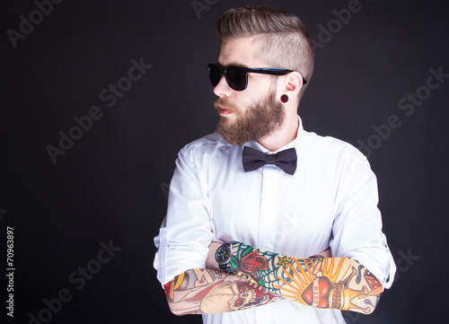 Slika na platnu young fashionable hipster man in white shirt