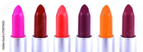 Set of lipsticks isolated on white