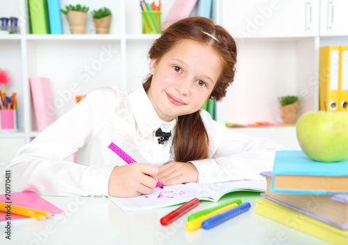 Cute girl at workplace in c...