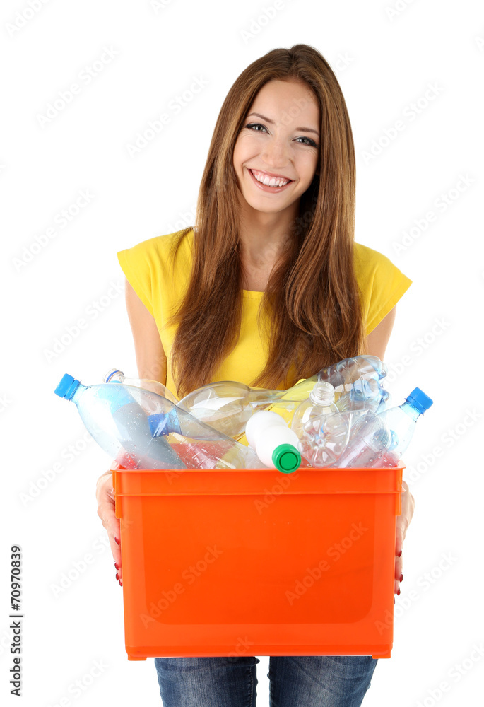 Young girl sorting plastic bottles isolated on white Young girl sorting plastic bottles isolated on white