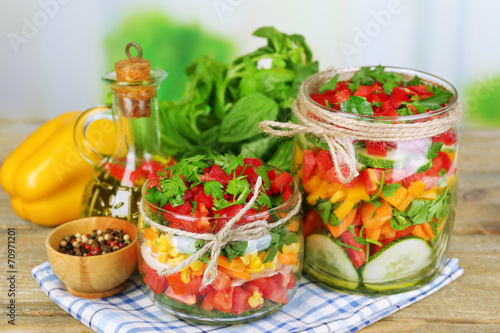 Vegetable salad in glass jars