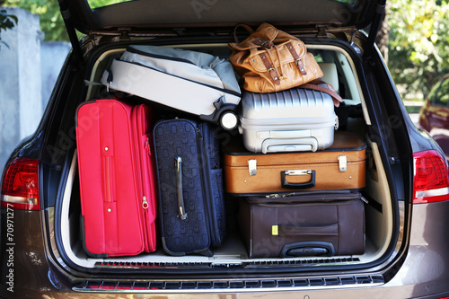 Photography Suitcases and bags in trunk of car ready to depart for holidays