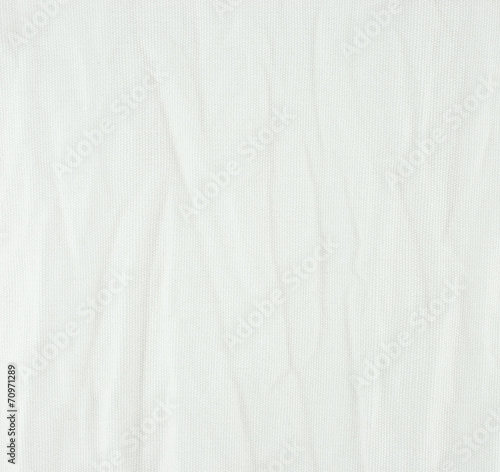 Wrinkle white canvas fabric texture.