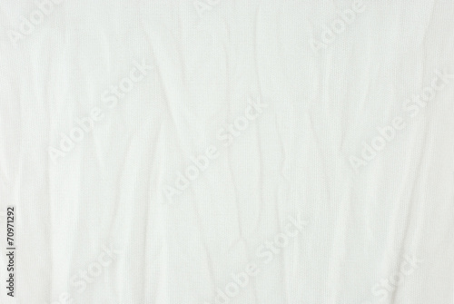 Wrinkle white canvas fabric texture.