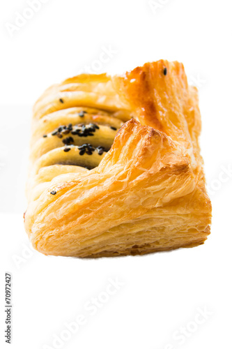 puff pastry and filling insied on white photo