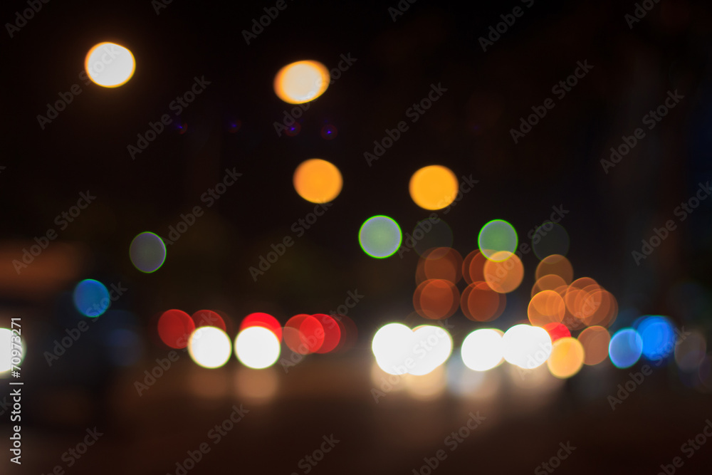 Bokeh blur of car lights on street at night. Bokeh blur of car lights on street at night.
