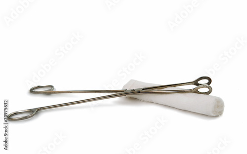 a surgical instrument with a bandage © ksena32