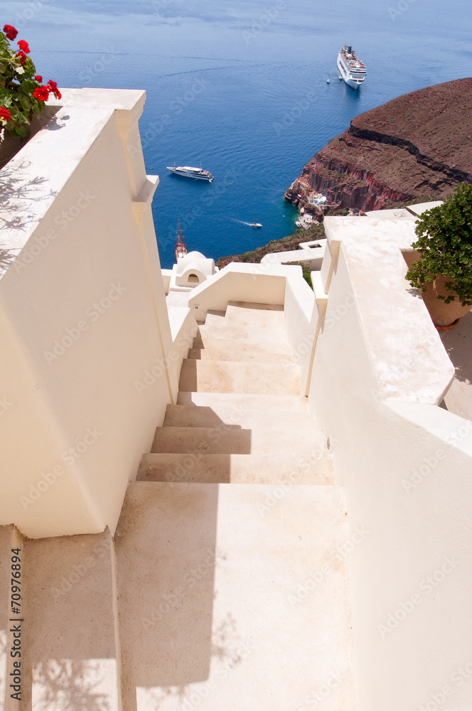 The stairs leading to the port in Oia town. Santorini, Greece.