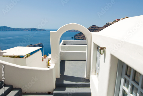 Etrance to the caved house with patio. Fira on Santorini. photo