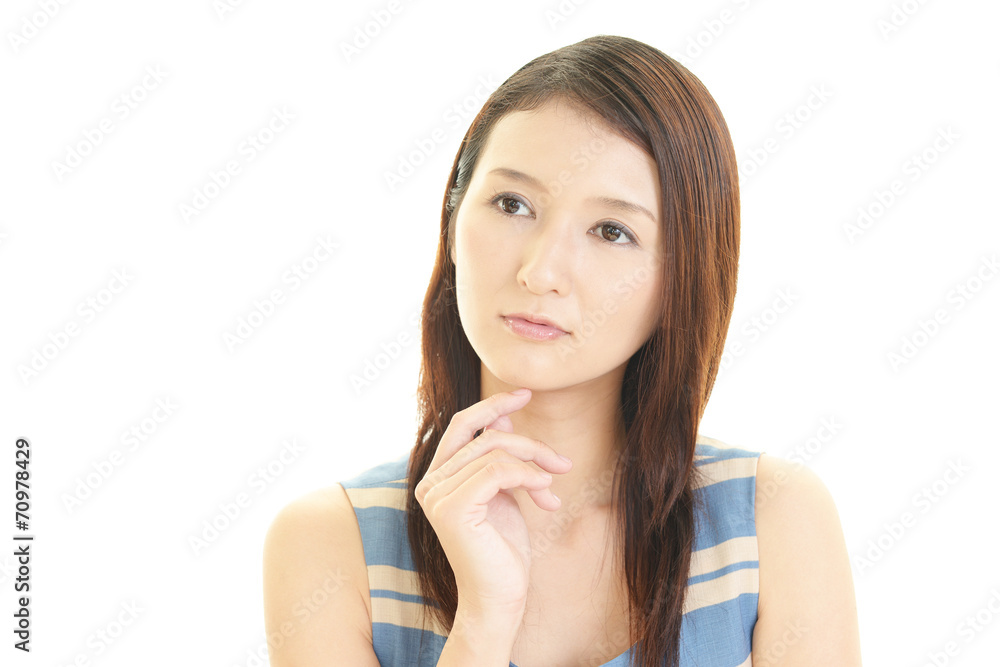 疲れた表情の女性