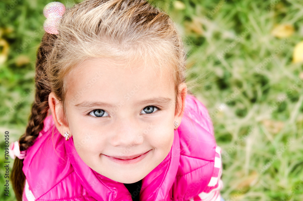 Autumn portrait of cute smiling little girl Autumn portrait of cute smiling little girl