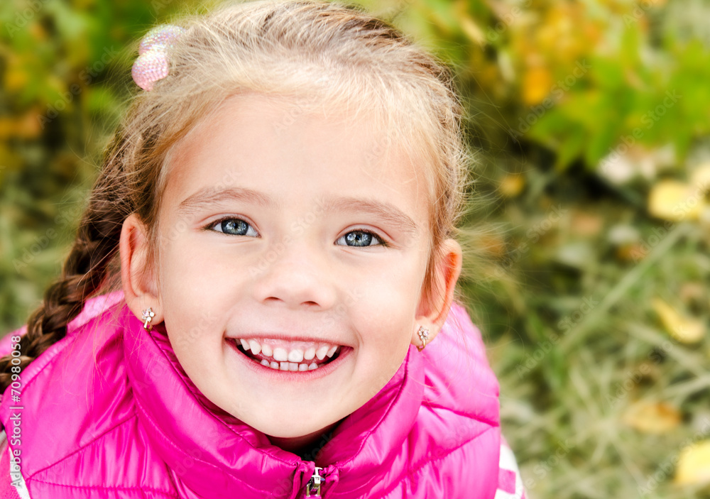 Autumn portrait of cute smiling little girl Autumn portrait of cute smiling little girl