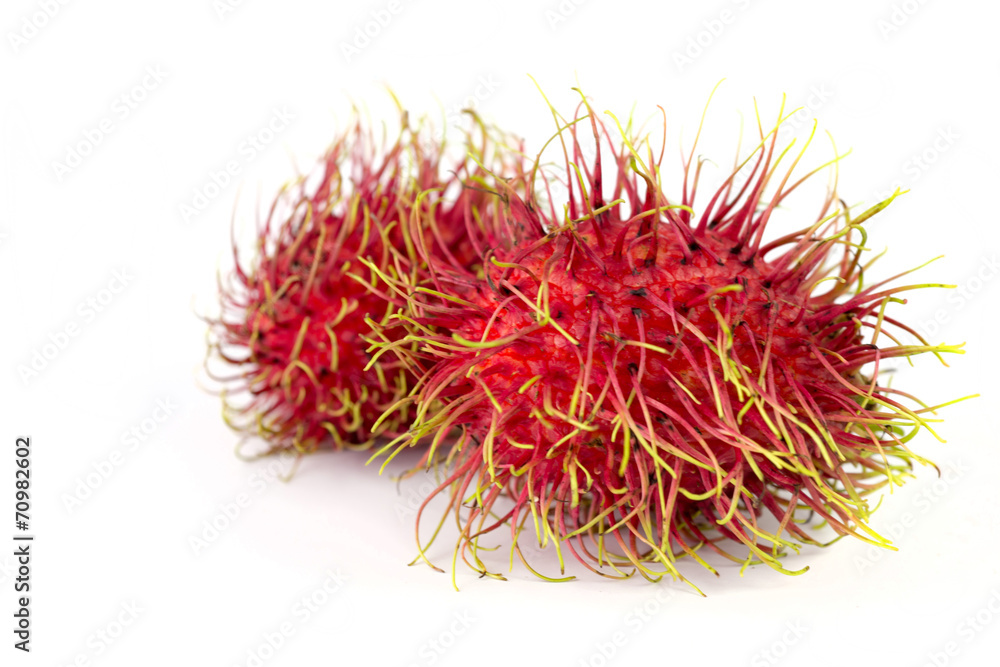 Naklejka premium rambutan on white background