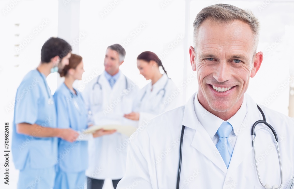 Smiling doctor looking at camera Smiling doctor looking at camera