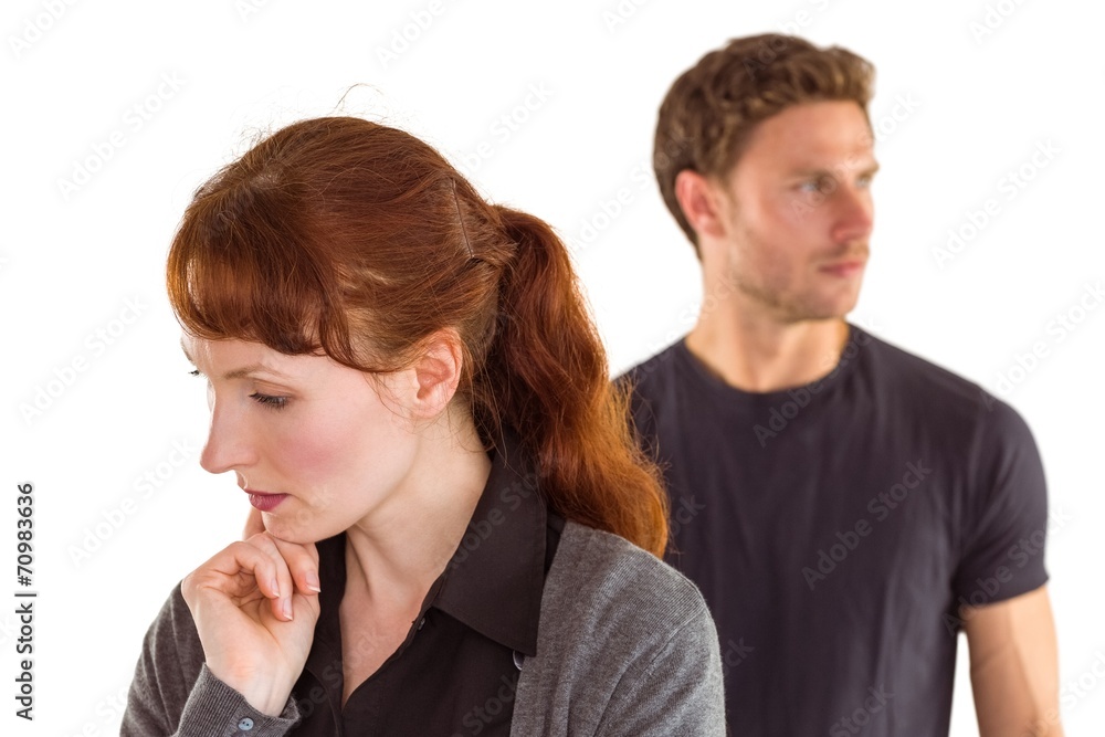 Worried woman with man behind Worried woman with man behind
