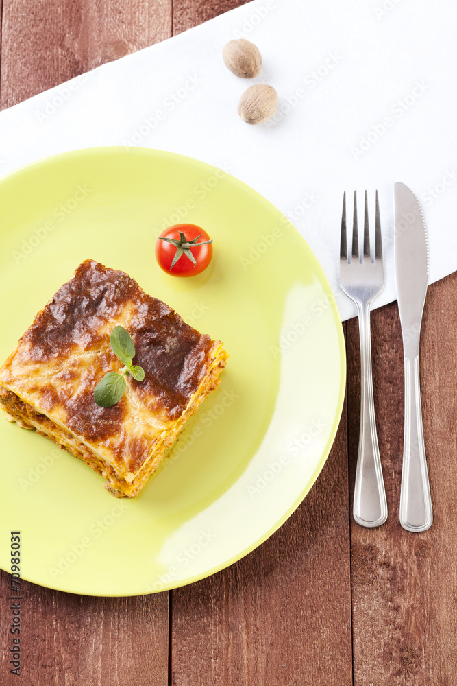 Portion of tasty lasagna on a plate Portion of tasty lasagna on a plate