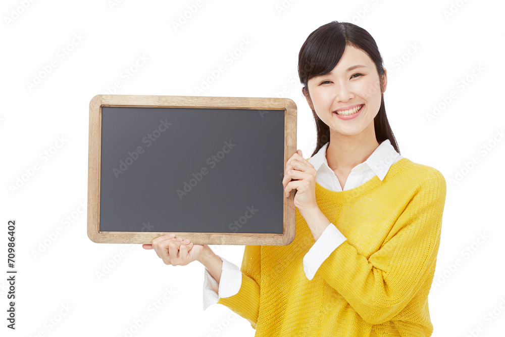 メッセージボードを持って笑う女性 メッセージボードを持って笑う女性