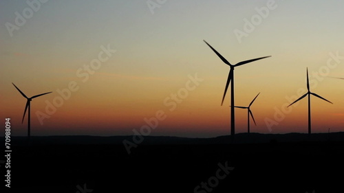 Wind turbine on sunset