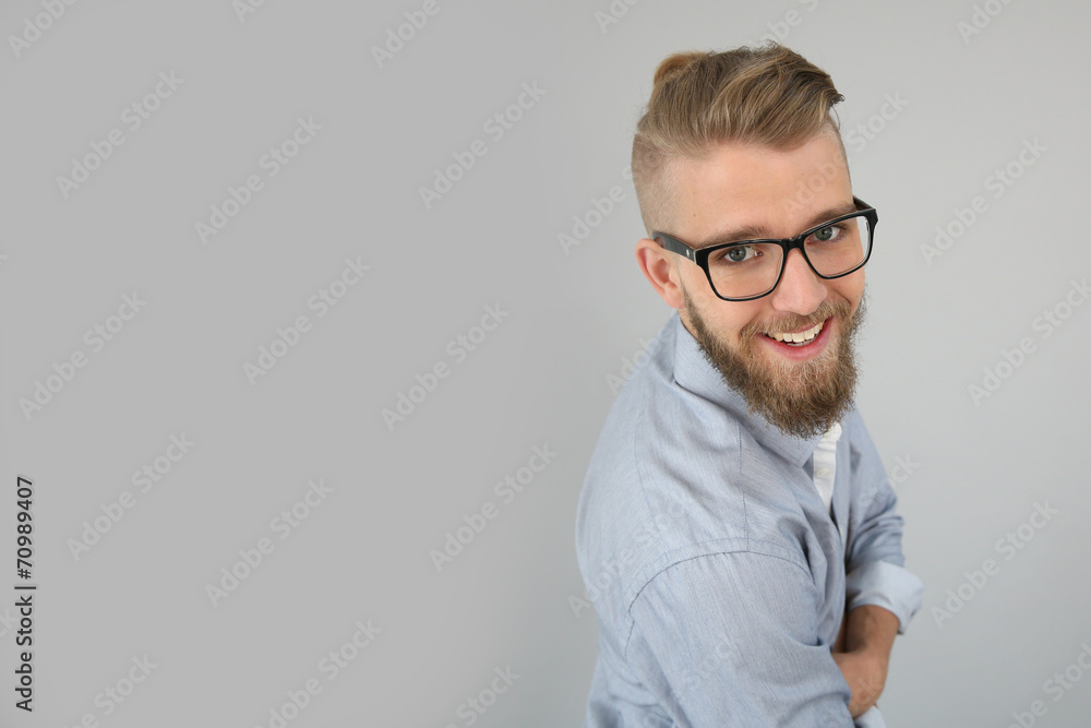 Portrait of smiling guy looking at camera, isolated Portrait of smiling guy looking at camera, isolated