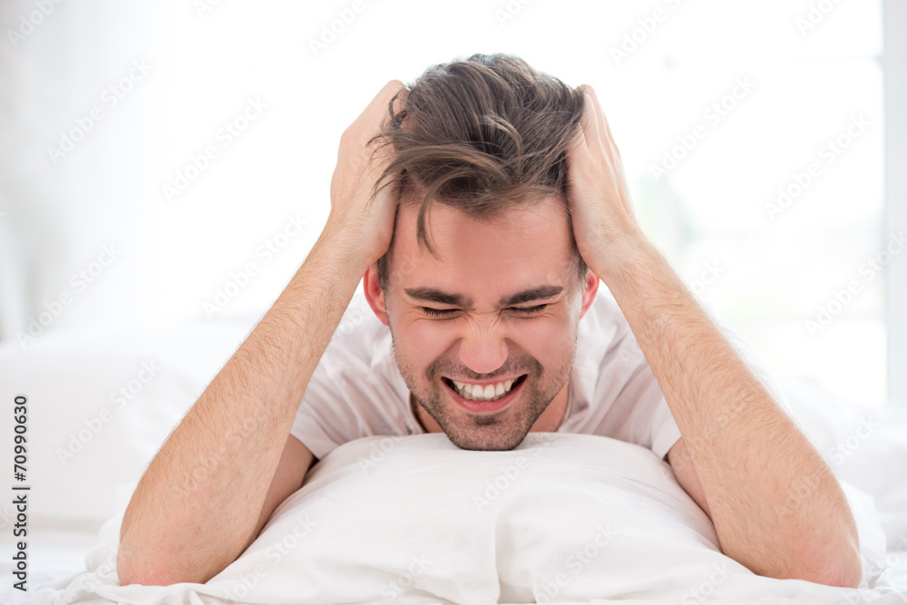 Angry sleepy young man Angry sleepy young man