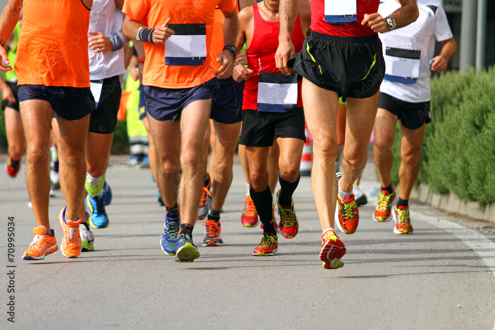 muscular legs of athletes engaged in long marathon muscular legs of athletes engaged in long marathon