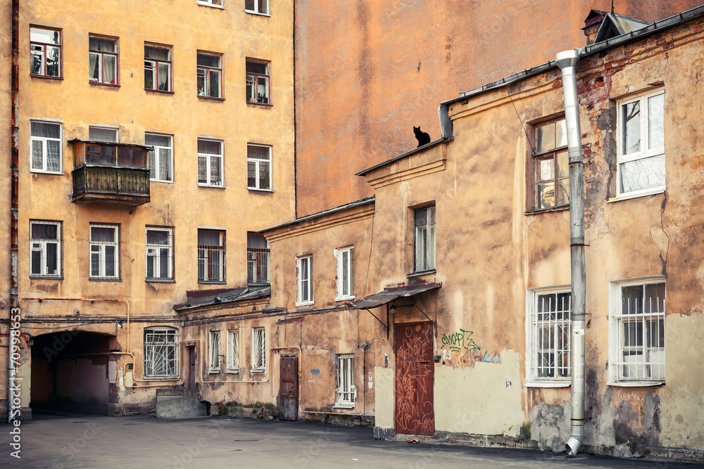 Street fragment with yellow houses. Saint-Petersburg, Russia