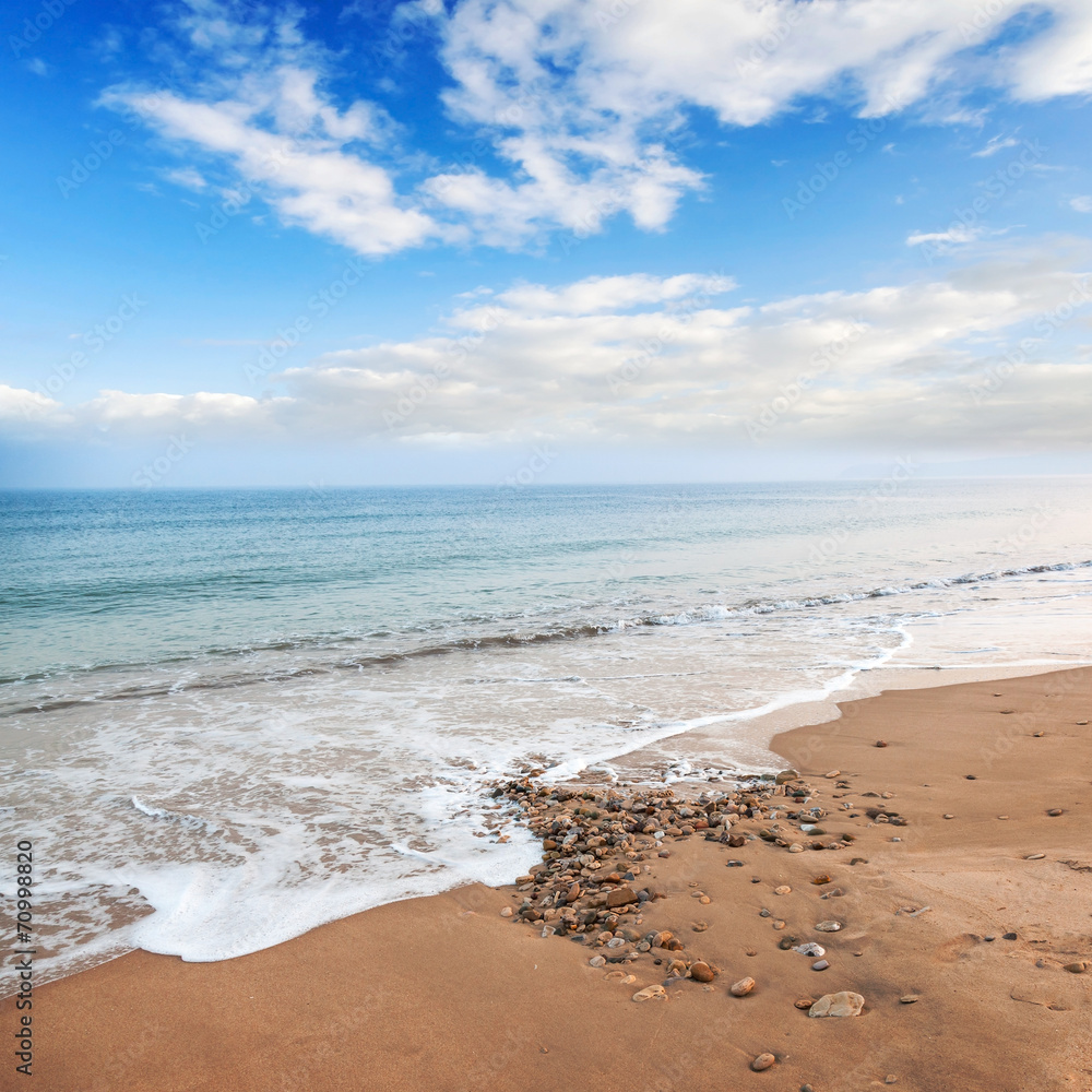 Atlantic ocean coast with bright cloudy sky Atlantic ocean coast with bright cloudy sky