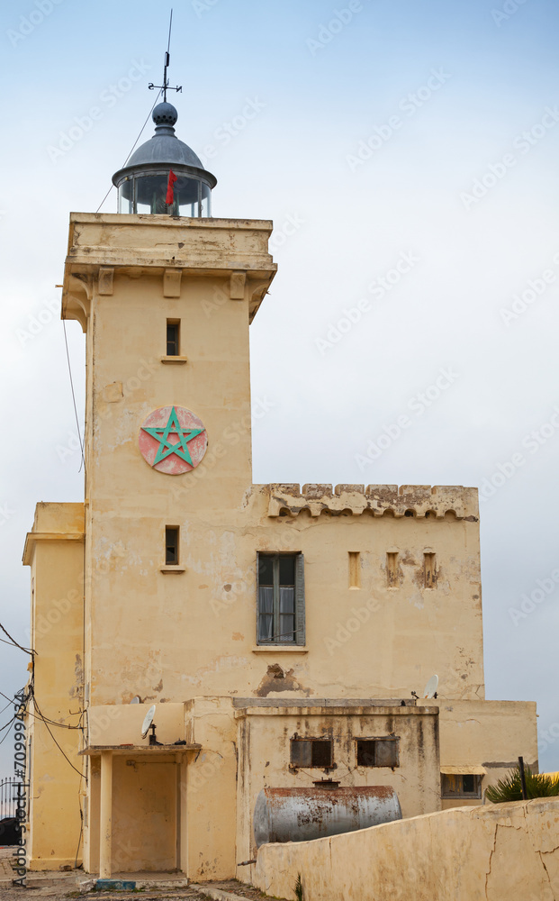 Yellow lighthouse tower. Cap Malabata, Tangier, Morocco