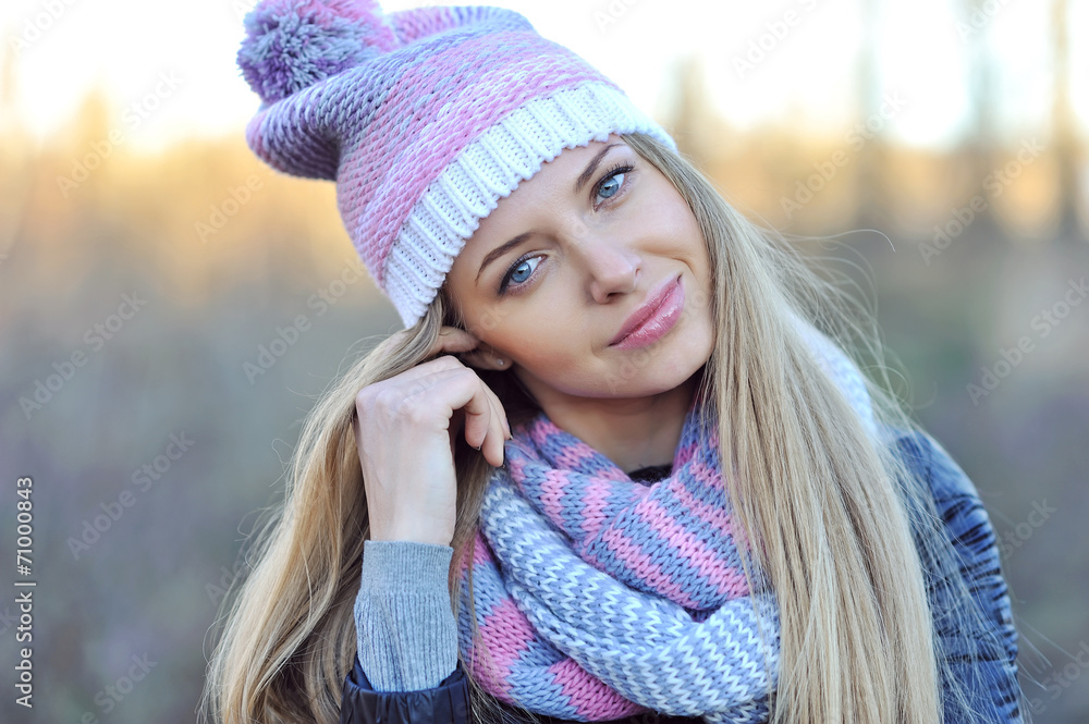 Pretty young woman wearing hat and scarf. Close up Pretty young woman wearing hat and scarf. Close up