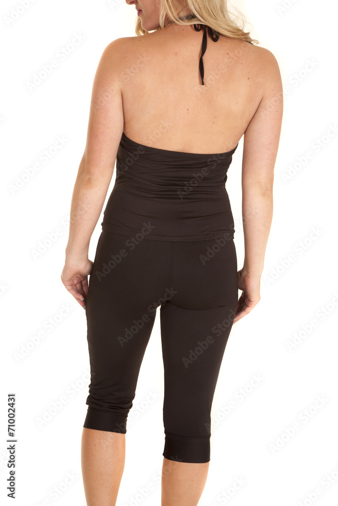 back woman capries looking to side back woman capries looking to side