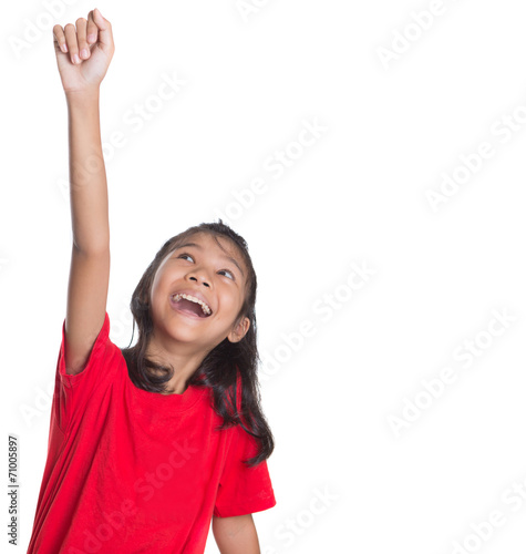 Young Asian girl raising her hands over white background