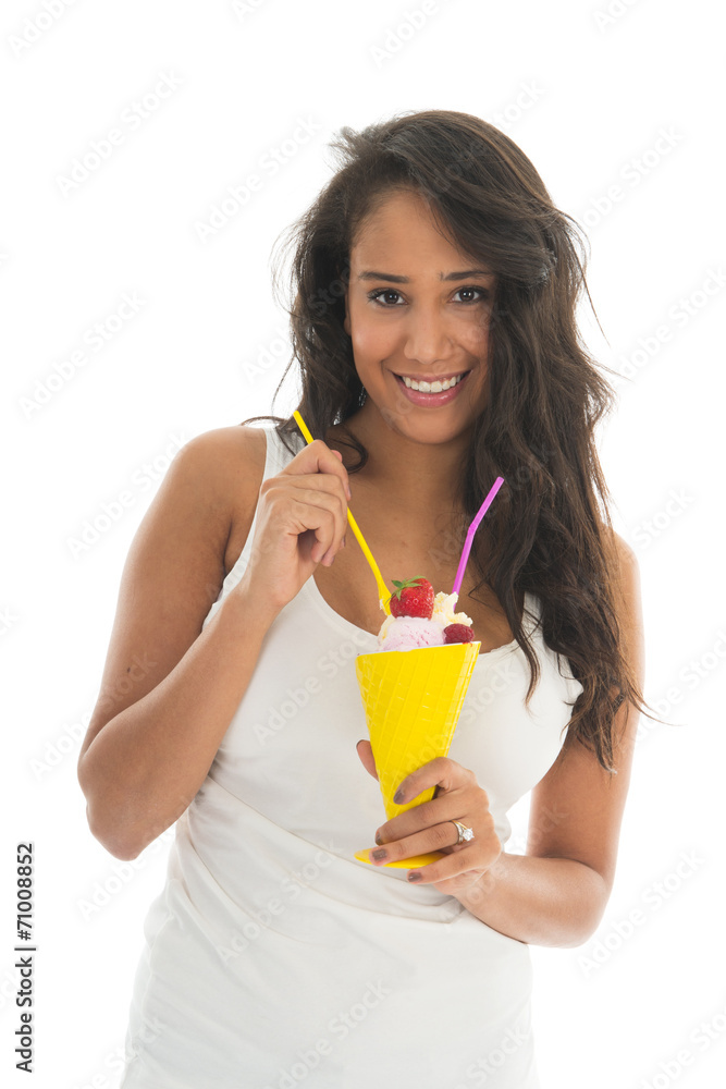 Black woman eating fruit sorbet in glass Black woman eating fruit sorbet in glass