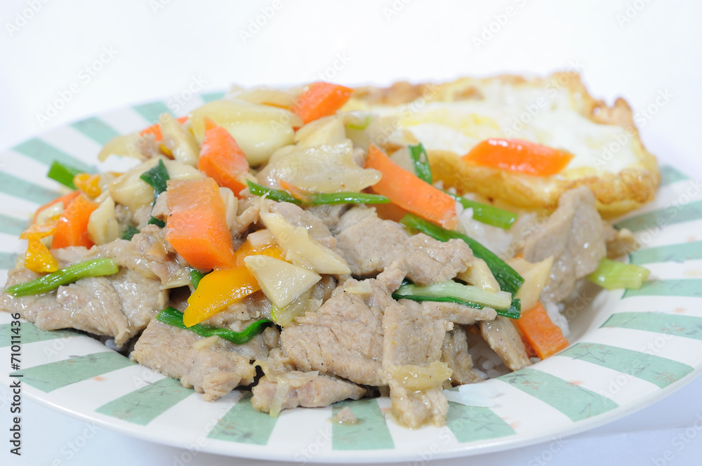 Cooked rice and mix vegetables with fried egg Cooked rice and mix vegetables with fried egg