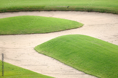 Sand bunker on golf field