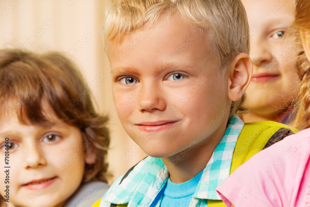 Close up view of boy and other kids together Close up view of boy and other kids together